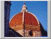 Duomo peeking behind cathedral and tower